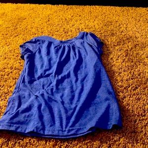 I am selling a blue shirt with no sleeves